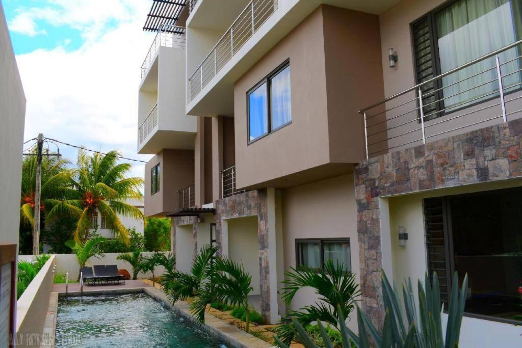 Modern And Cosy Condo: Westwood Apartments Flic en Flac ภายนอก รูปภาพ